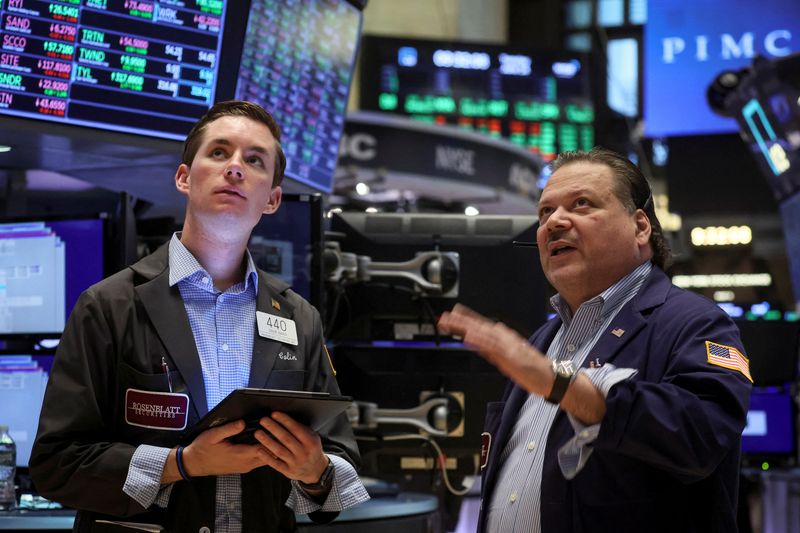 Wall St ends up but still down on week as volatility rules