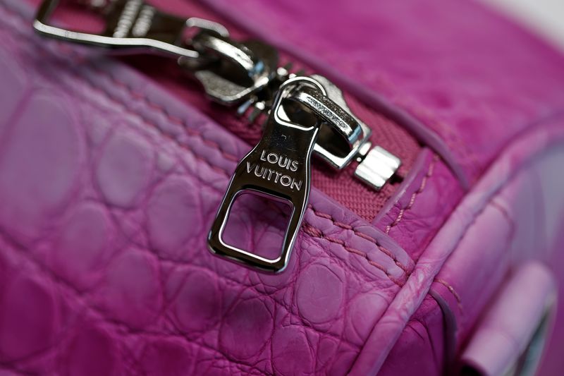 © Reuters. FILE PHOTO: A handbag manufactured at the Atelier Louis Vuitton is pictured during the inauguration in Vendome, France, February 22, 2022. REUTERS/Benoit Tessier