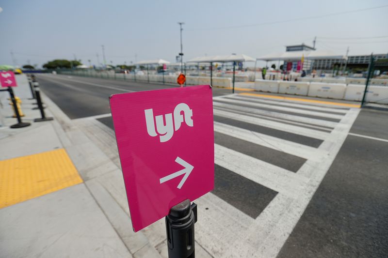 &copy; Reuters. An empty Lyft pick-up area is shown as rideshare drivers hold a rally as part of a statewide day of action to demand that ride-hailing companies Uber and Lyft follow California law and grant drivers "basic employee rights'', in Los Angeles, California, U.