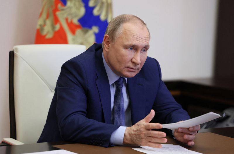 &copy; Reuters.   ロシアのプーチン大統領は１７日、米国が他国を「植民地」として扱っていると非難した。モスクワで７日撮影。大統領府提供（２０２２年　ロイター)
