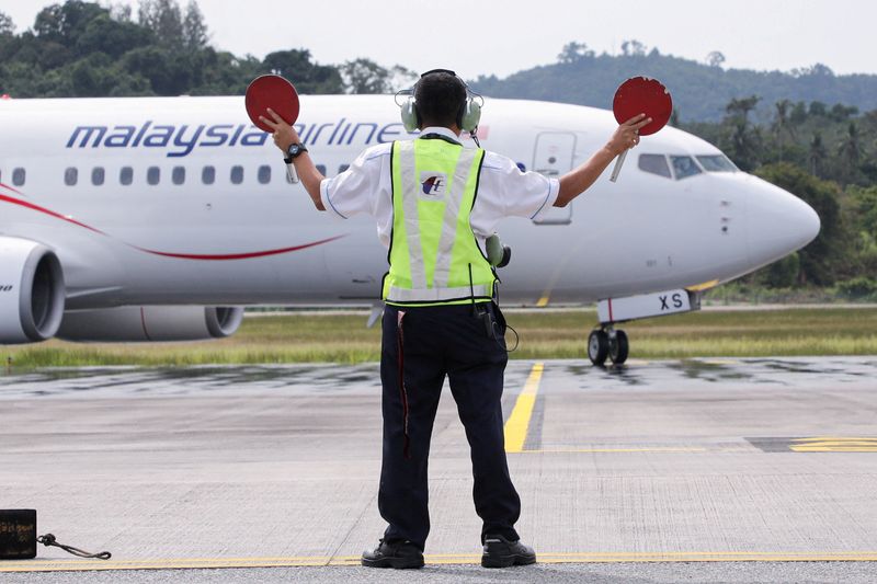 &copy; Reuters. Malaysia Airlines prévoit d'annoncer sa décision sur le remplacement de sa flotte de 21 Airbus A330 avec des appareils de nouvelle génération plus économes en carburant entre la mi et la fin juillet, a dit dimanche le directeur général de la compag