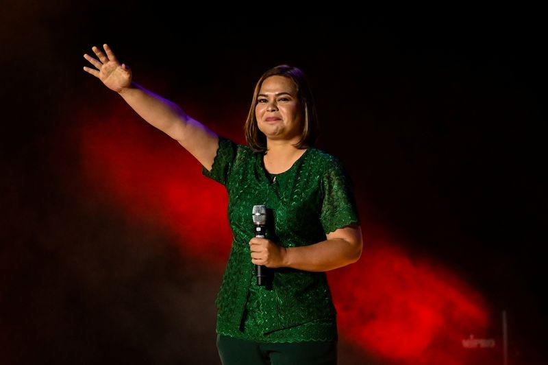 &copy; Reuters. FILE PHOTO: Vice-presidential candidate Sara Duterte-Carpio, daughter of Philippine President Rodrigo Duterte, waves to her supporters during the first day of campaign period for the 2022 presidential election, at the Philippine Arena, in Bocaue, Bulacan 