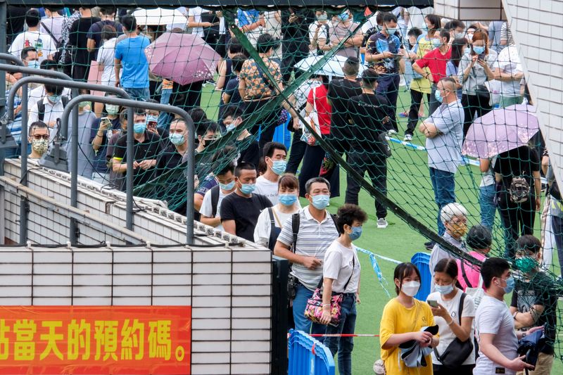 &copy; Reuters. ６月２１日　マカオで２１日、新型コロナウイルスの感染者が出たカジノホテルが当局により封鎖された。２０日、マカオで撮影。（２０２２年　ロイター／John Mak ）