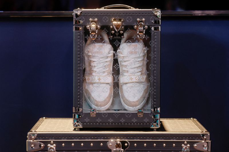 &copy; Reuters. FILE PHOTO: A pair of Louis Vuitton brand sneakers is pictured in a travel box, at the Viva Technology conference dedicated to innovation and startups, at Porte de Versailles exhibition center in Paris, France June 16, 2022. REUTERS/Benoit Tessier/File Ph