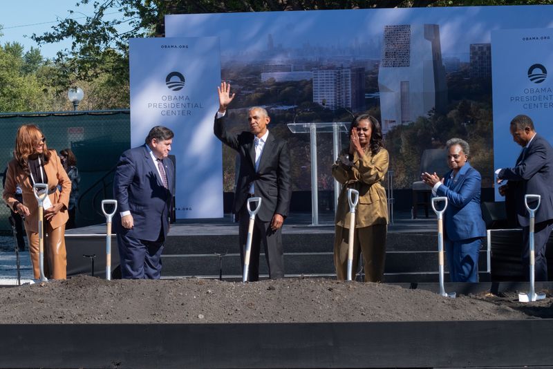 &copy; Reuters. 5th Ward Alderman Leslie A. Hairston,  Illinois Governor J.B. Pritzker, Former U.S. president Barack Obama, Former First Lady Michelle Obama, Mayor Lori Lightfoot, and Alderperson (7th ward) Greg Mitchell celebrate during the groundbreaking ceremony for t