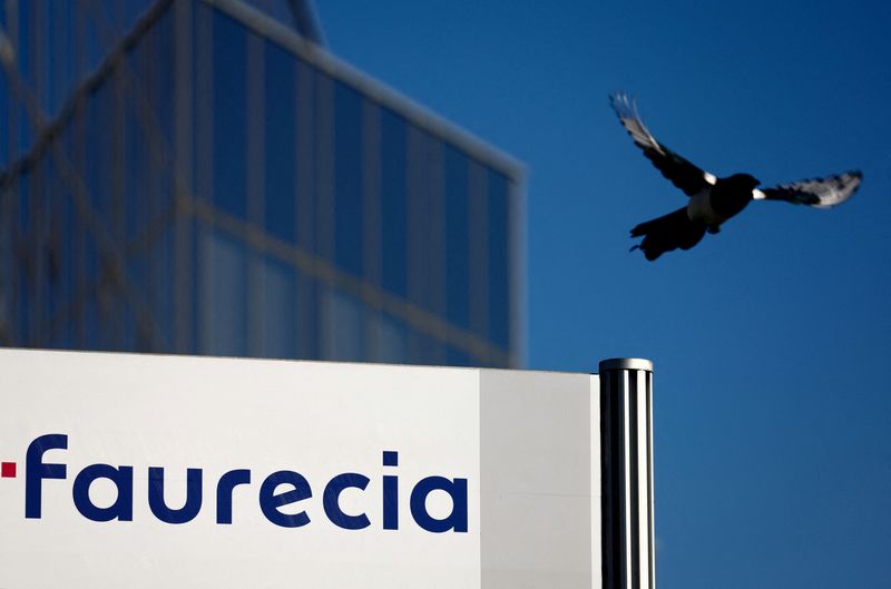 &copy; Reuters. FILE PHOTO: A logo of French car parts supplier Faurecia is seen near the company's headquarters in Nanterre near Paris, France, February 7, 2022. REUTERS/Gonzalo Fuentes