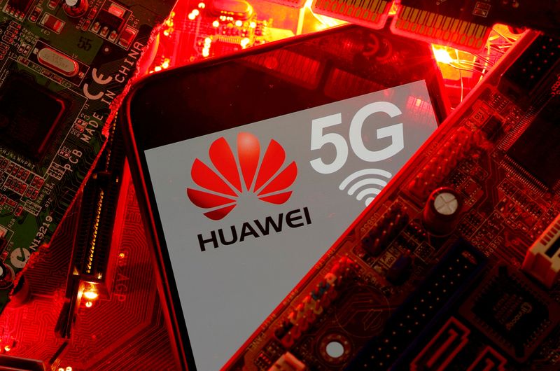 &copy; Reuters. FILE PHOTO: A smartphone with the Huawei and 5G network logo is seen on a PC motherboard in this illustration picture taken January 29, 2020. REUTERS/Dado Ruvic/File Photo