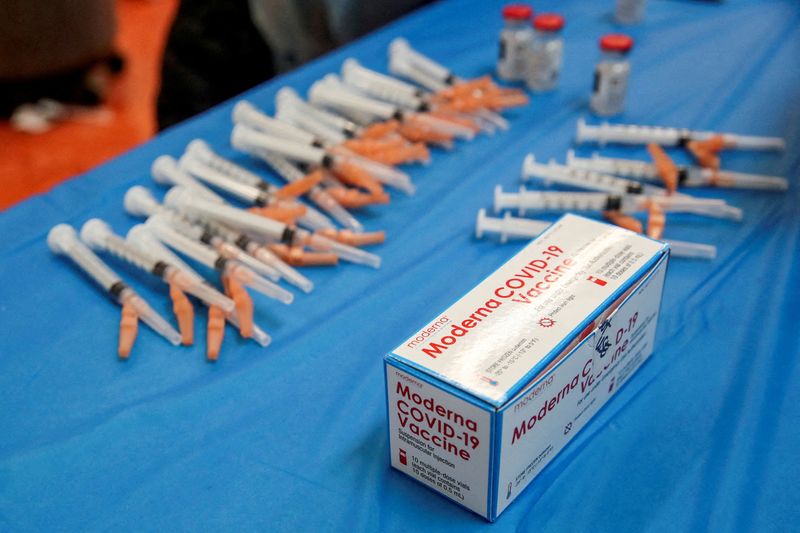 &copy; Reuters. FILE PHOTO: The Moderna COVID-19 vaccine sits on the table at Trinity United Church of Christ in Chicago, Illinois, U.S., February 13, 2021.  REUTERS/Kamil Krzaczynski/File Photo