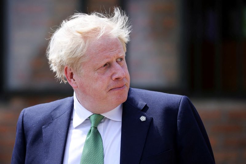 &copy; Reuters. FILE PHOTO: British Prime Minister Boris Johnson looks on during a visit to the GS Kacyiru II school on the sidelines of the Commonwealth Heads of Government Meeting (CHOGM) in Kigali, Rwanda June 23, 2022. Dan Kitwood/Pool via REUTERS