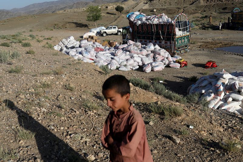 &copy; Reuters. Packets of aid are seen in the quake-hit area of Wor Kali village in the Barmal district of Paktika province, Afghanistan, June 25, 2022. REUTERS/Ali Khara