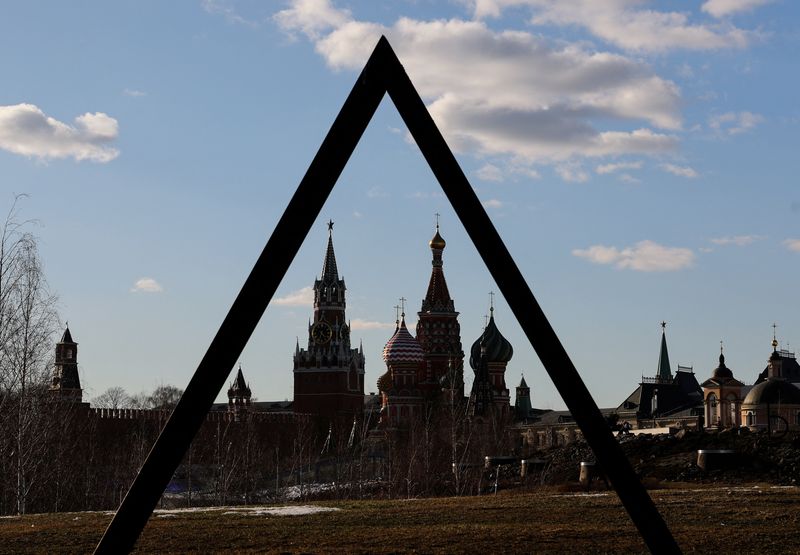 &copy; Reuters. FILE PHOTO: The Kremlin's Spasskaya Tower and St. Basil's Cathedral are seen through the art object in Zaryadye park in Moscow, Russia March 15, 2022.  REUTERS/Evgenia Novozhenina/File Photo