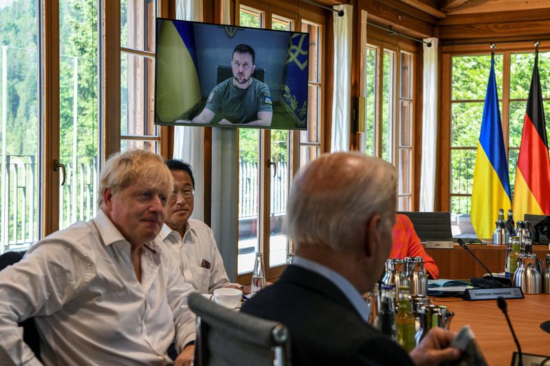 &copy; Reuters. Ukrainian President Volodymyr Zelenskiy appears onscreen to update G7 leaders on the Russia-Ukraine war during the G7 Summit, in the Bavarian Alps, Germany June 27, 2022. Kenny Holston/Pool via REUTERS