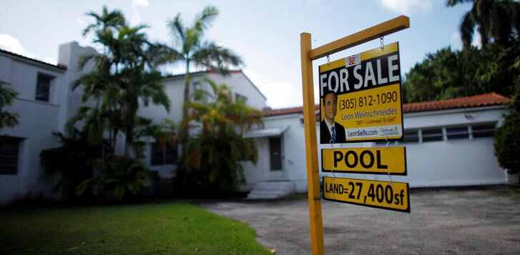 &copy; Reuters. FILE PHOTO: A for sale sign sits outside a house in Miami Beach October 22, 2009. REUTERS/Carlos Barria/File Photo