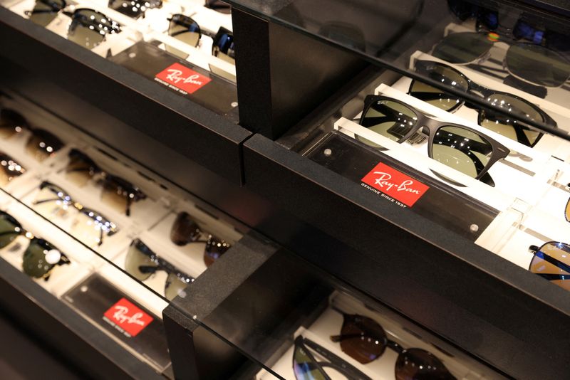 &copy; Reuters. FILE PHOTO: Ray-Ban sunglasses are pictured for sale in a Sunglass Hut, both brands owned by EssilorLuxottica SA, in Manhattan, New York City, U.S., November 30, 2021. REUTERS/Andrew Kelly/File Photo