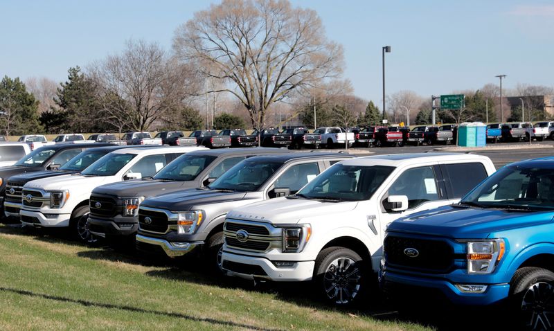 &copy; Reuters. FILE PHOTO: Newly manufactured Ford Motor Co. 2021 F-150 pick-up trucks are seen waiting for missing parts in Dearborn, Michigan, U.S., March 29, 2021. Picture taken March 29, 2021.  REUTERS/Rebecca Cook/File Photo