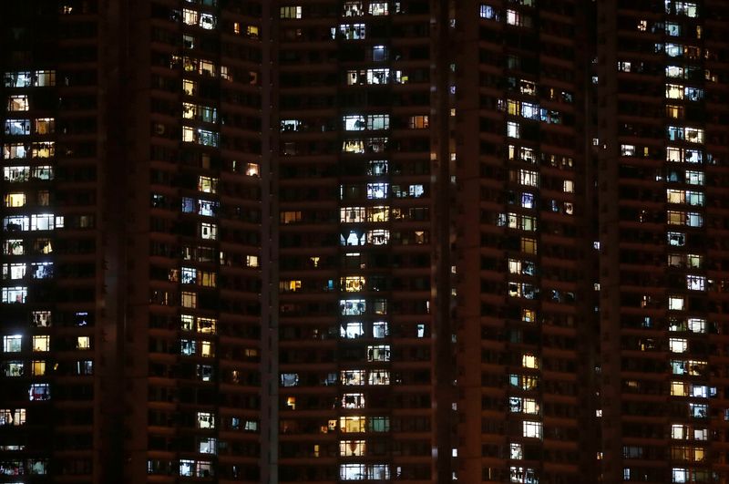 &copy; Reuters. FILE PHOTO: General view of an apartment building at the Tuen Mun neighbourhood in Hong Kong, China, August 20, 2019. REUTERS/Kai Pfaffenbach