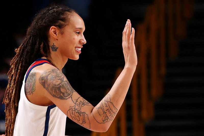 &copy; Reuters. FILE PHOTO: Brittney Griner of the United States congratulates a team mate during their Women's Basketball Gold Medal game against Japan at the Tokyo 2020 Summer Olympics at the Saitama Super Arena in Saitama, Japan, August 8, 2021.  REUTERS/Brian Snyder