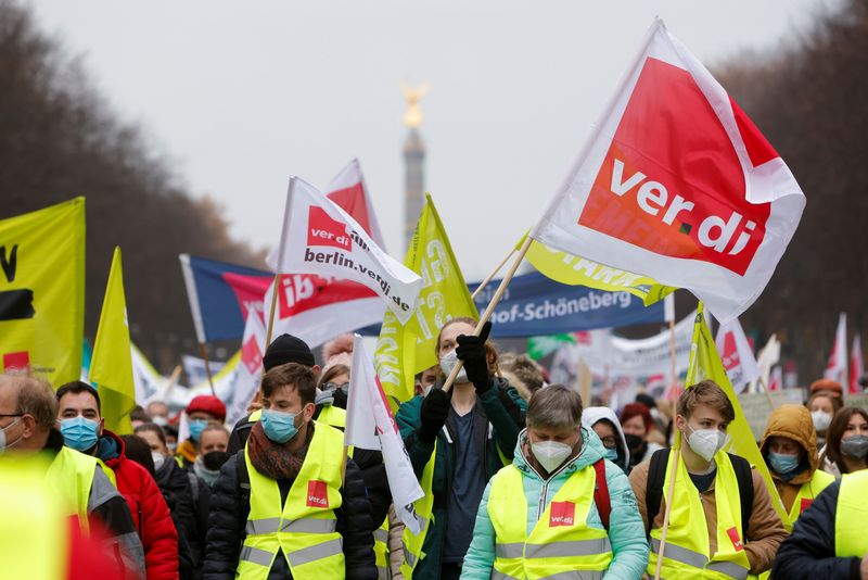 &copy; Reuters. FILE PHOTO: People take part in a protest of German trade union Verdi in Berlin, Germany November 25, 2021.  REUTERS/Michele Tantussi