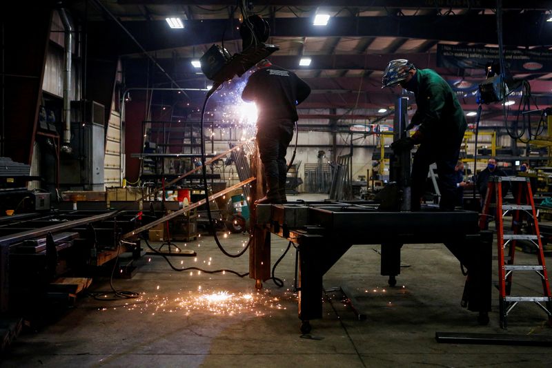 &copy; Reuters. FILE PHOTO: Matt Arnold, CEO of Look Trailers, tours the company&apos;s utility trailer manufacturing facility in Middlebury