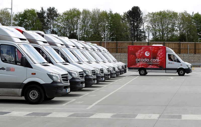 &copy; Reuters. FILE PHOTO: Delivery vans lined up prior to dispatch at the Ocado CFC (Customer Fulfilment Centre) in Andover, Britain May 1, 2018. REUTERS/Peter Nicholls