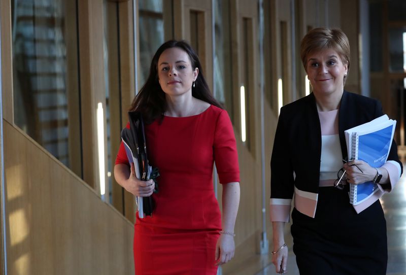 &copy; Reuters. FILE PHOTO: Scotland's First Minister Nicola Sturgeon walks to the chamber with Kate Forbes MSP Minister for Public Finance in Edinburgh, Scotland, Britain February 6, 2020. REUTERS/Russell Cheyne
