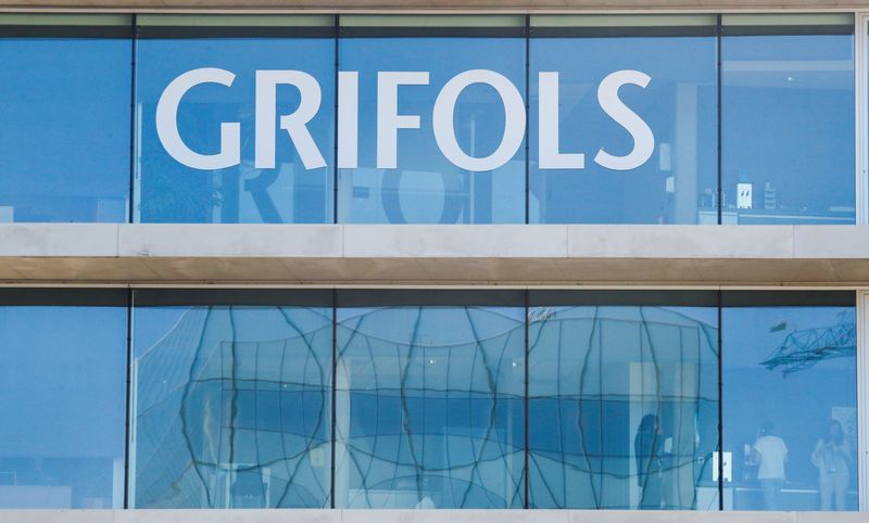 &copy; Reuters. FILE PHOTO: The logo of the Spanish pharmaceuticals company Grifols is pictured on their headquarters' building in Sant Cugat del Valles, near Barcelona, Spain, September 17, 2021. REUTERS/Albert Gea