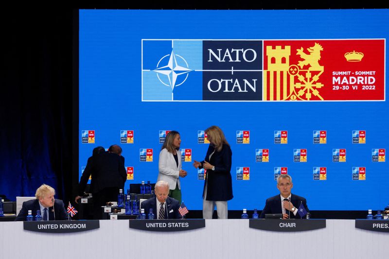 &copy; Reuters. British Prime Minister Boris Johnson, U.S. President Joe Biden and NATO Secretary General Jens Stoltenberg attend the round table of a NATO summit in Madrid, Spain June 30, 2022. REUTERS/Yves Herman
