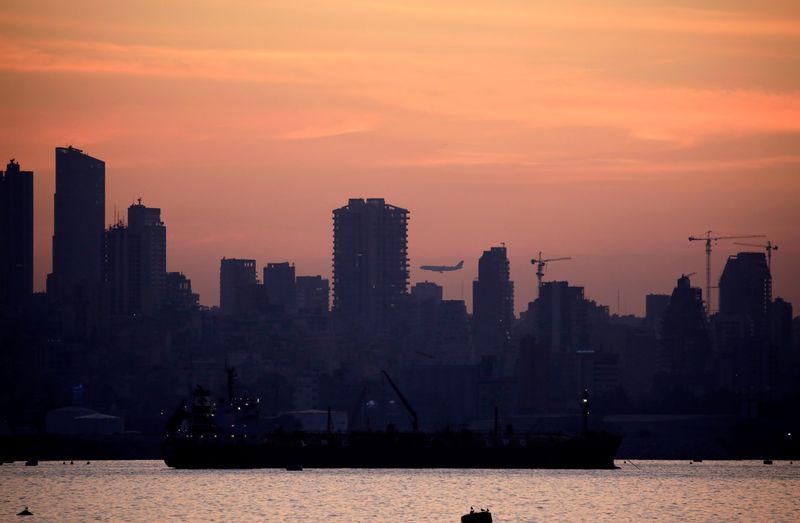 &copy; Reuters. FILE PHOTO: A plane flies as the skyline of Beirut is seen during sunset from Antelias, Lebanon November 20, 2019. REUTERS/Andres Martinez Casares