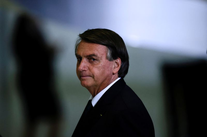 &copy; Reuters. Brazil's President Jair Bolsonaro looks on after a ceremony about the National Policy for Education at the Planalto Palace in Brasilia, Brazil June 20, 2022. REUTERS/Ueslei Marcelino