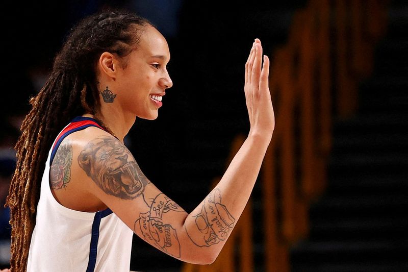 &copy; Reuters. FILE PHOTO: Brittney Griner of the United States congratulates a team mate during their Women's Basketball Gold Medal game against Japan at the Tokyo 2020 Summer Olympics at the Saitama Super Arena in Saitama, Japan, August 8, 2021.  Picture taken August 