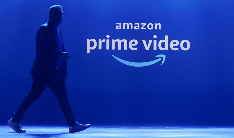 &copy; Reuters. FILE PHOTO: A man walks past a logo of Amazon Prime Video during a launch event in Mumbai, India, April 28, 2022. REUTERS/Francis Mascarenhas