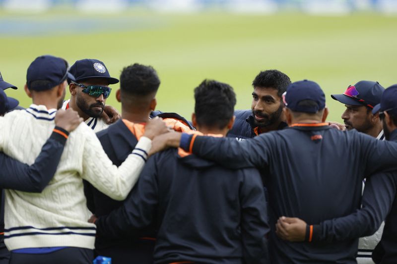 &copy; Reuters. Cricket - Fifth Test - England v India - Edgbaston, Birmingham, Britain - July 1, 2022 India's Jasprit Bumrah with teammates during the warm up before the match Action Images via Reuters/Jason Cairnduff