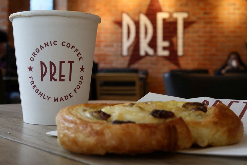 &copy; Reuters. FILE PHOTO: A coffee and a pastry are seen on a table inside a Pret A Manger store in Liverpool, Britain, September 22, 2021. REUTERS/Phil Noble