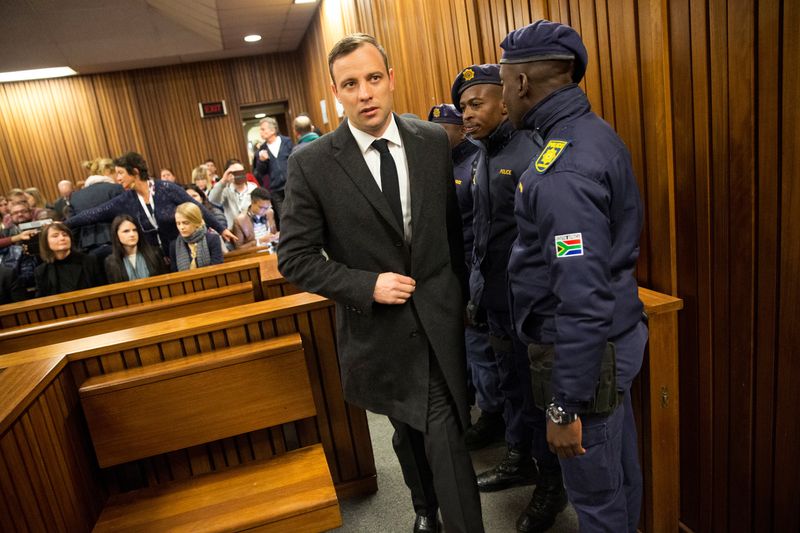 Jailed South African paralympic star Pistorius met victim's father