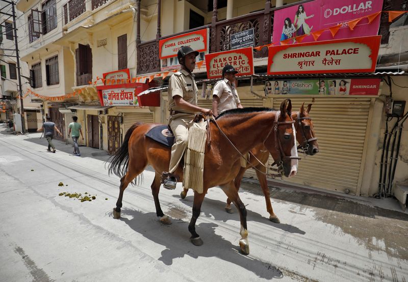 Indian police arrest 'masterminds' behind murder of Hindu tailor - officials