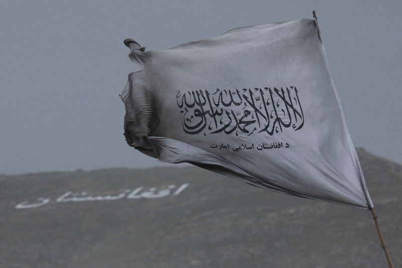 &copy; Reuters. FILE PHOTO: The Taliban flag is seen in a marketplace in Kabul, Afghanistan, May 10, 2022. REUTERS/Ali Khara/File Photo