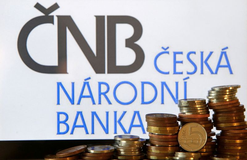 &copy; Reuters. FILE PHOTO: Czech Crown coins are seen in front of a displayed logo of the Czech central bank (CNB) in this picture illustration taken April 1, 2017. REUTERS/David W Cerny/Illustration