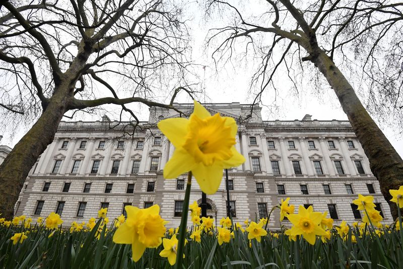 &copy; Reuters. Daffodils bloom in front of the Treasury building, ahead of Wednesday's budget being delivered by Britain's Chancellor of the Exchequer Rishi Sunak, in London, Britain, March 1, 2021. REUTERS/Toby Melville/File Photo