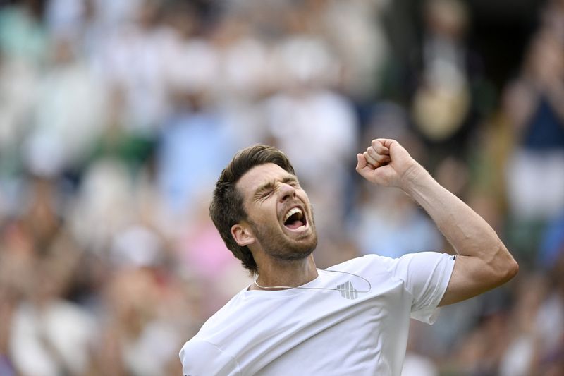 &copy; Reuters. Tennis - Wimbledon - All England Lawn Tennis and Croquet Club, London, Britain - July 3, 2022 Britain's Cameron Norrie celebrates winning his fourth round match against Tommy Paul of the U.S. REUTERS/Toby Melville