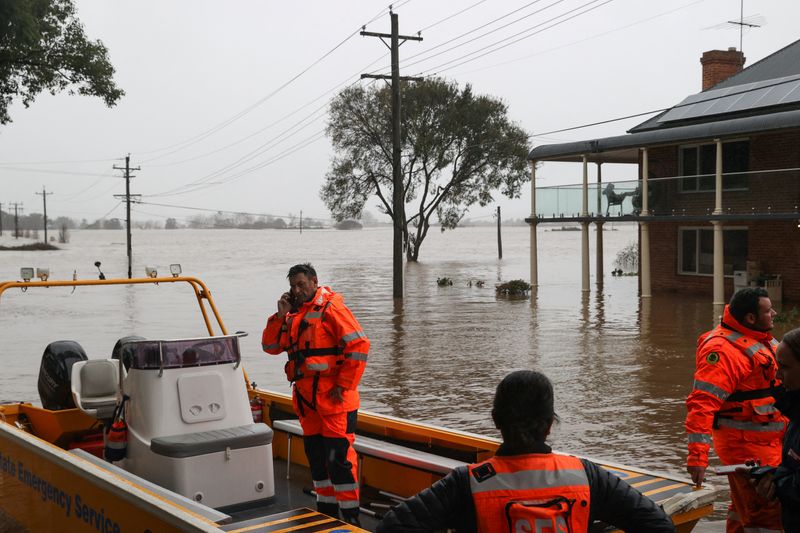 &copy; Reuters. 　７月５日、オーストラリア東海岸を週末に襲った豪雨で最大都市シドニーの洪水被害が拡大している。写真はシドニーで撮影（２０２２年　ロイター／Loren Elliott）
