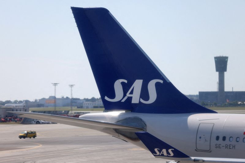 &copy; Reuters. FILE PHOTO: The tail fin of a parked Scandinavian Airlines (SAS) airplane is seen on the tarmac at Copenhagen Airport Kastrup in Copenhagen, Denmark, July 3, 2022. REUTERS/Andrew Kelly