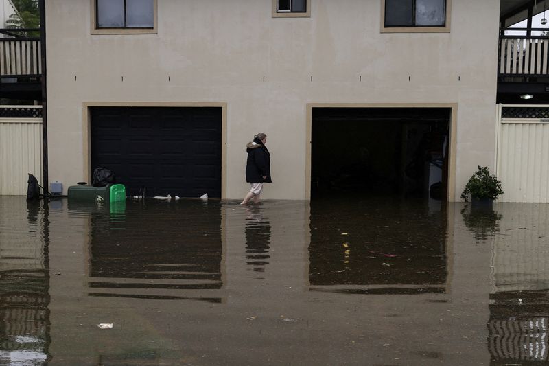 Flood-weary residents assess the damage after Sydney's recent deluge