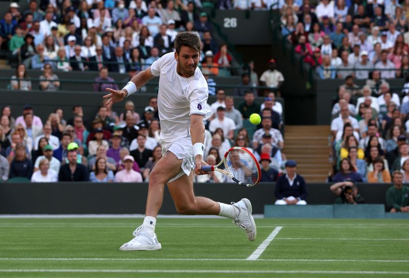 &copy; Reuters. Tennis - Wimbledon - All England Lawn Tennis and Croquet Club, London, Britain - July 5, 2022   Britain's Cameron Norrie in action during his quarter final match against Belgium's David Goffin REUTERS/Paul Childs