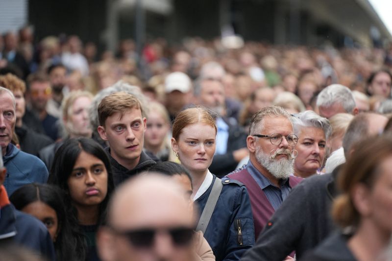 Danes mourn death of three in Copenhagen mall shooting