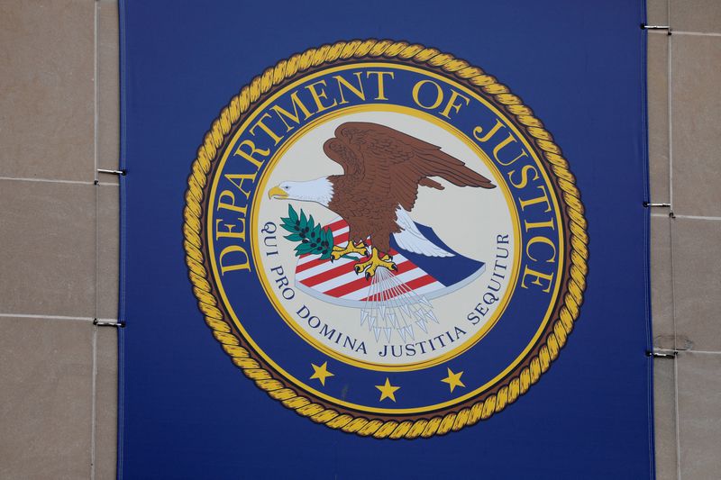 &copy; Reuters. FILE PHOTO: The crest of the United States Department of Justice is seen at its headquarters in Washington, D.C., U.S., May 10, 2021. REUTERS/Andrew Kelly/File Photo