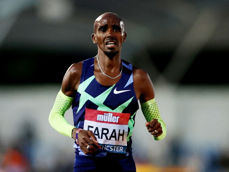 © Reuters. FILE PHOTO: Britain's Mo Farah reacts after the Men's 10,000m at British Athletic Championships on June 25, 2021 as he fails to qualify for the 10,000m at the Tokyo Olympics Action Images via Reuters/Molly Darlington