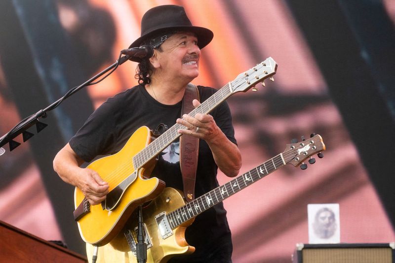 &copy; Reuters. FILE PHOTO: Singer Carlos Santana performs during the "We Love NYC: The Homecoming Concert" at Central Park in New York City, New York, U.S., August 21, 2021. REUTERS/Eduardo Munoz