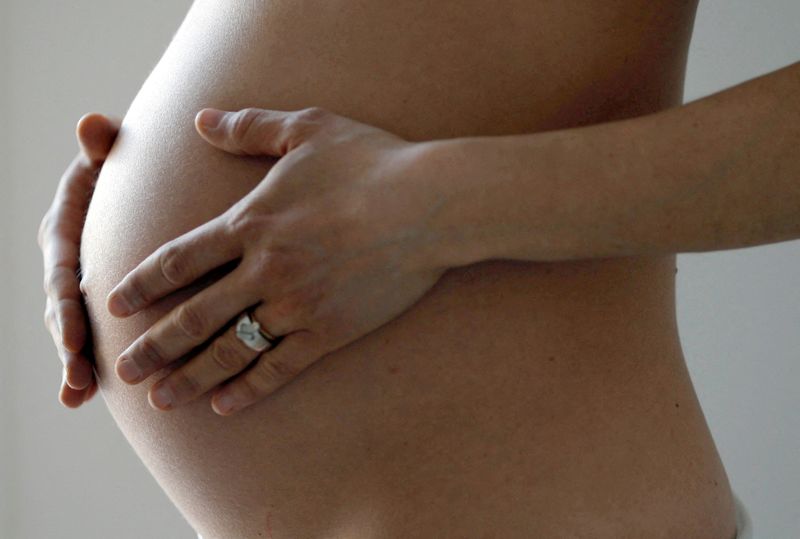 &copy; Reuters. FILE PHOTO: A pregnant woman, in the last trimester of her pregnancy, poses in this illustration photo in Sete, South France, March 26, 2016. REUTERS/Regis Duvignau/File Photo