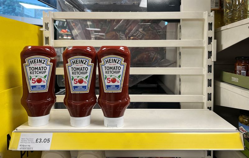 &copy; Reuters. Plastic bottles of Heinz tomato ketchup sit on a shelf in a Tesco store in London, Britain June 30, 2022.   REUTERS/Simon Newman/File Photo