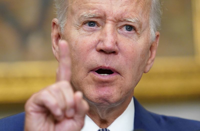 Biden says he is determined to ban assault weapons